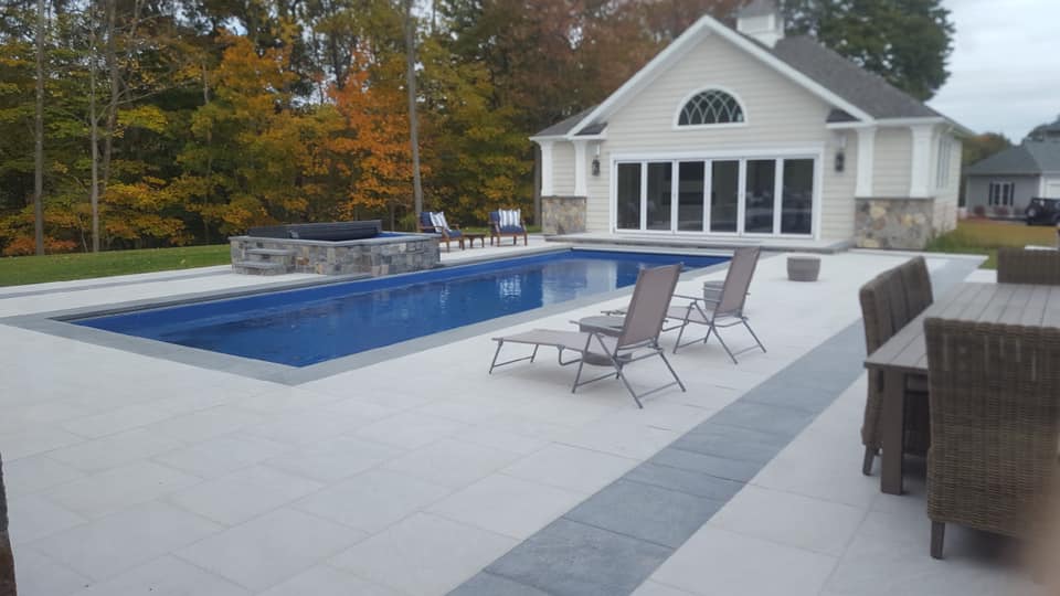 A rectangular pool and a spa